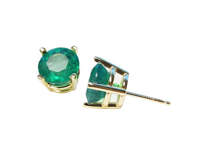 Round cut emerald stud earrings