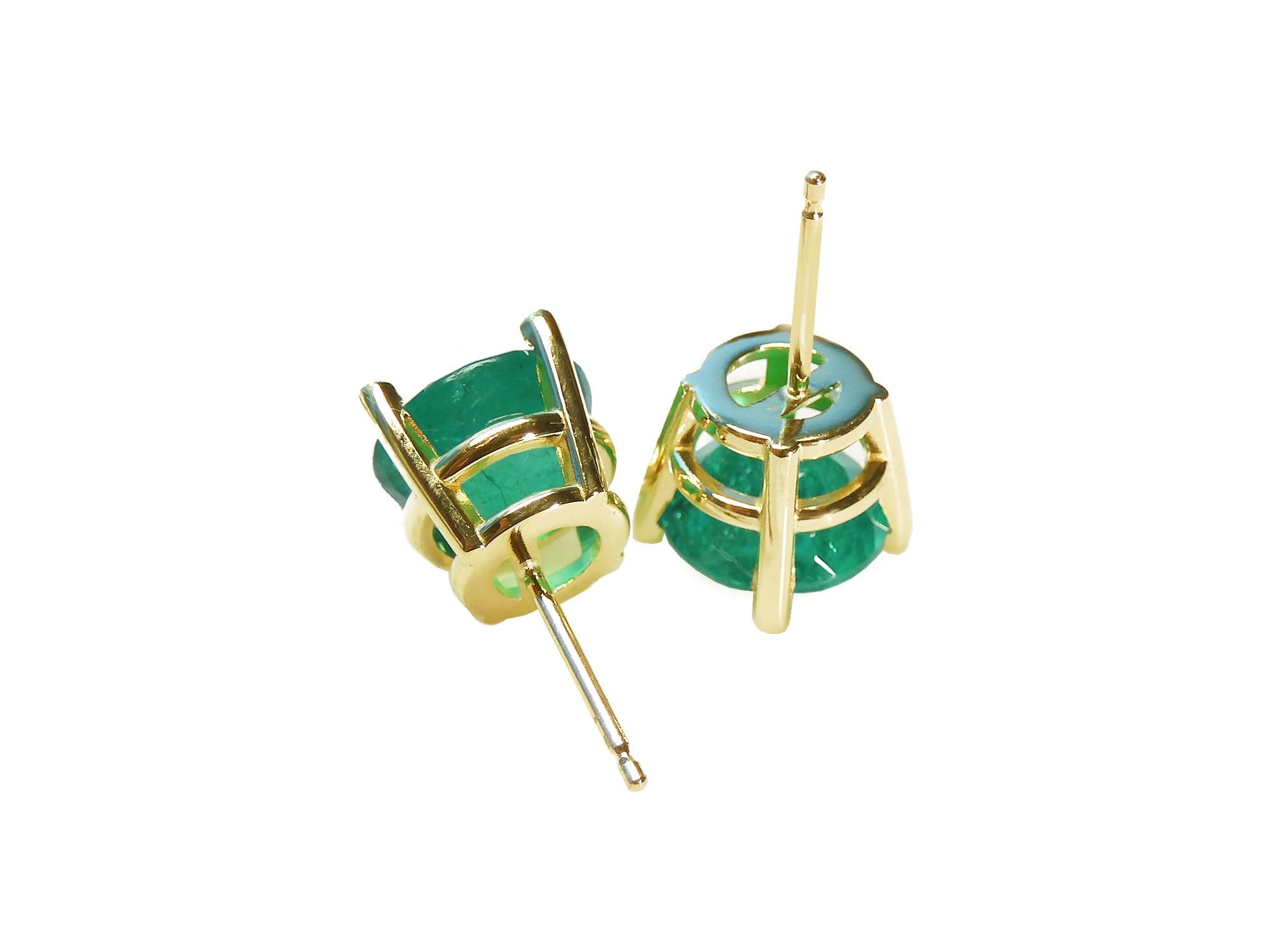 Yellow gold emerald stud earrings