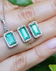 Green fire emerald earrings and pendant