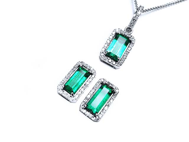 Muzo earrings and emerald pendant