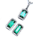 Muzo earrings and emerald pendant
