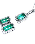 Halo diamonds emerald earrings