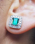 Stud halo emerald earrings
