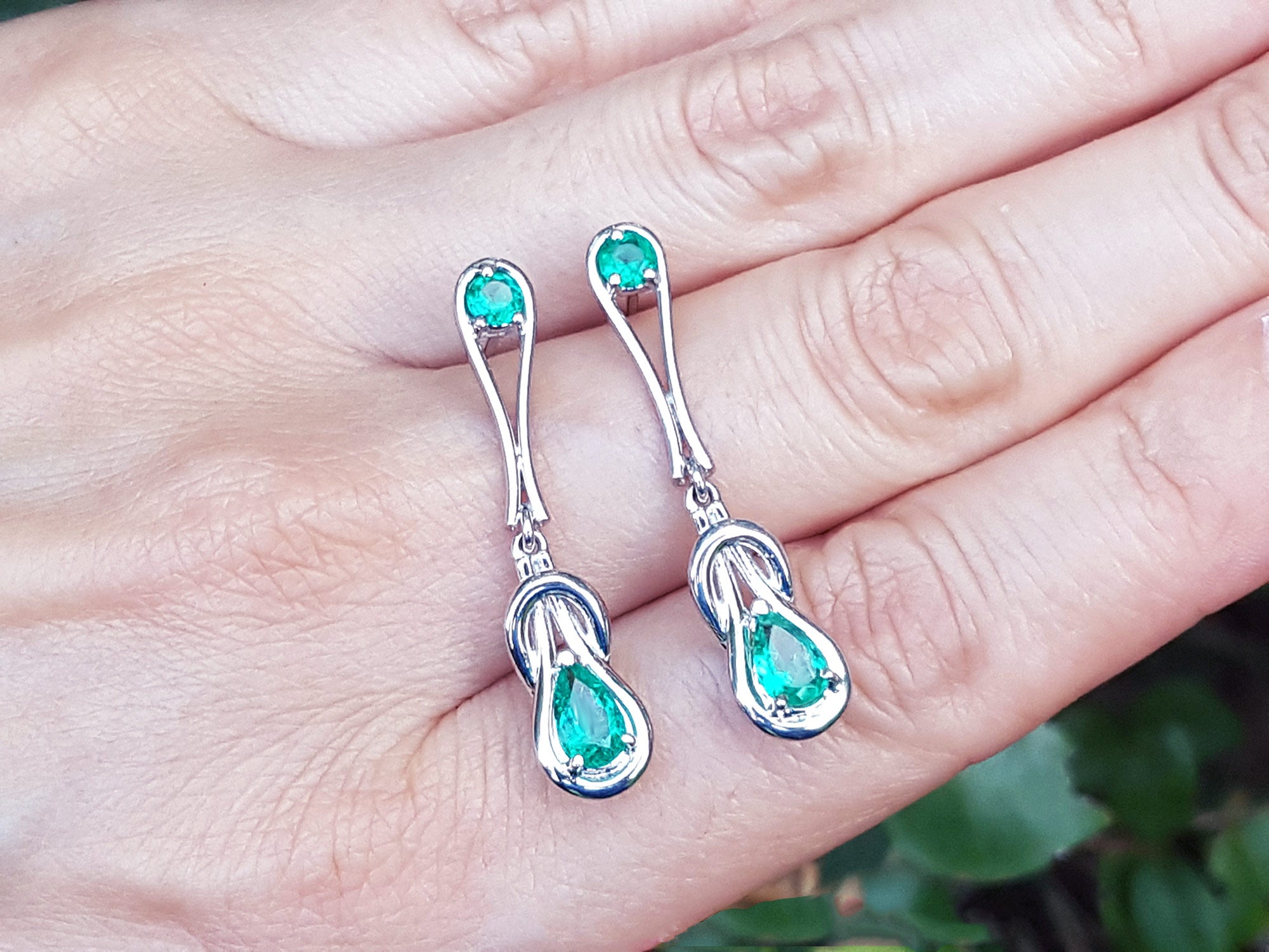 For her Love Knot emerald earrings