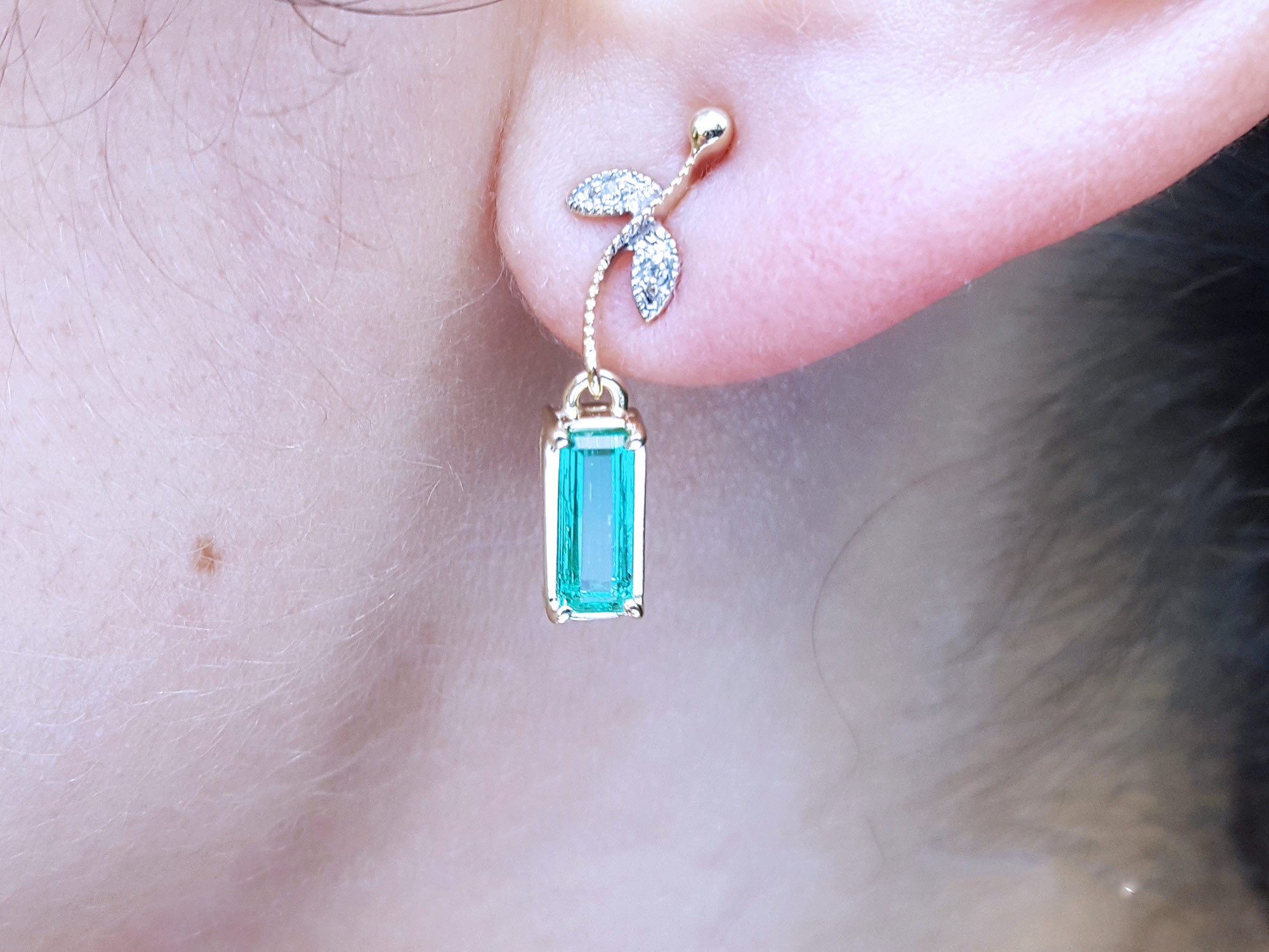 Emerald-cut emerald earrings