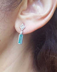 Baguette cut emerald earrings