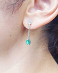 Emerald pear cut dangle earrings