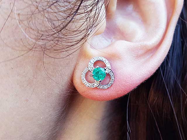 Round cut emerald earrings