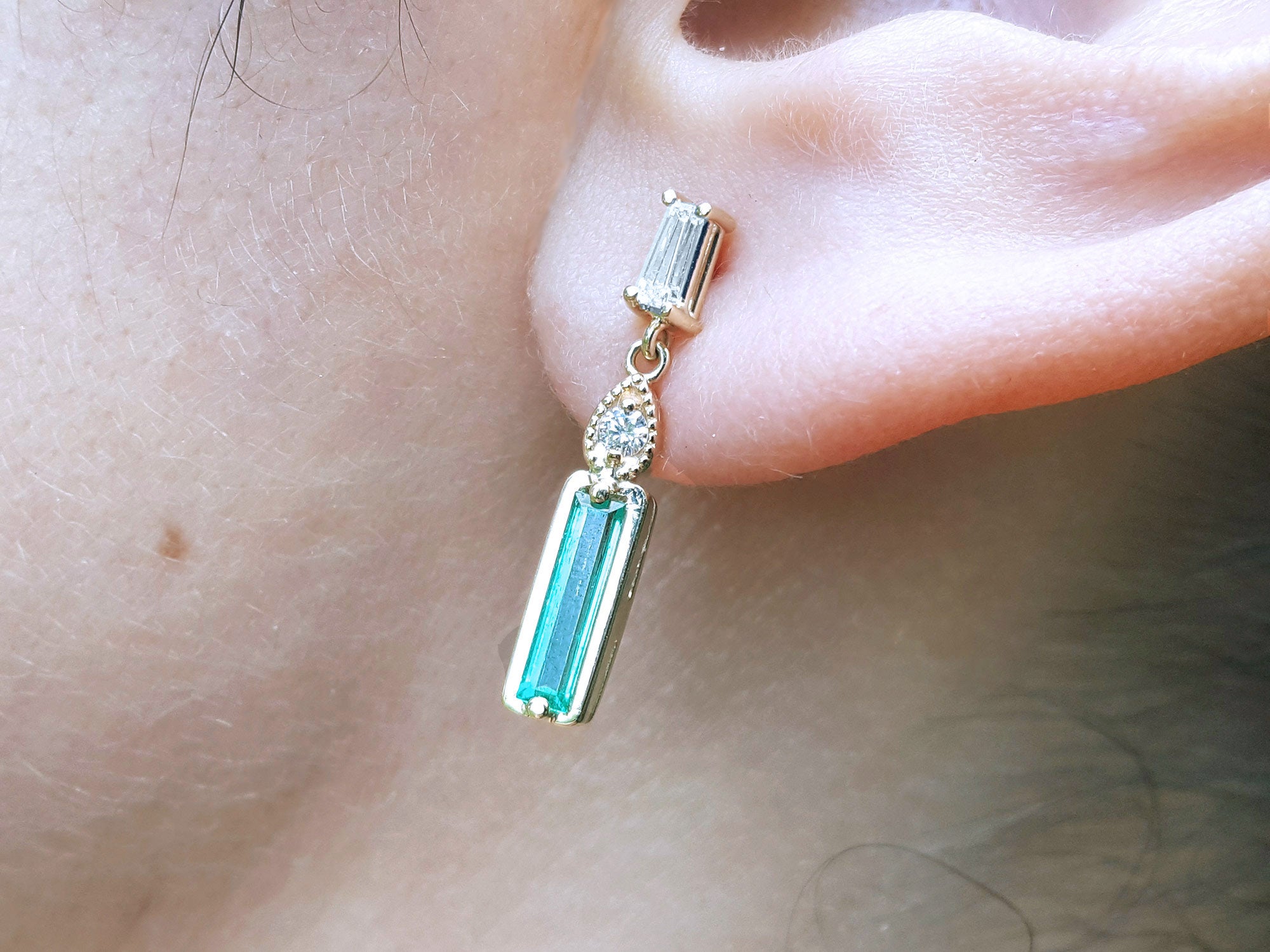 14K gold Baggette cut emerald stud earrings