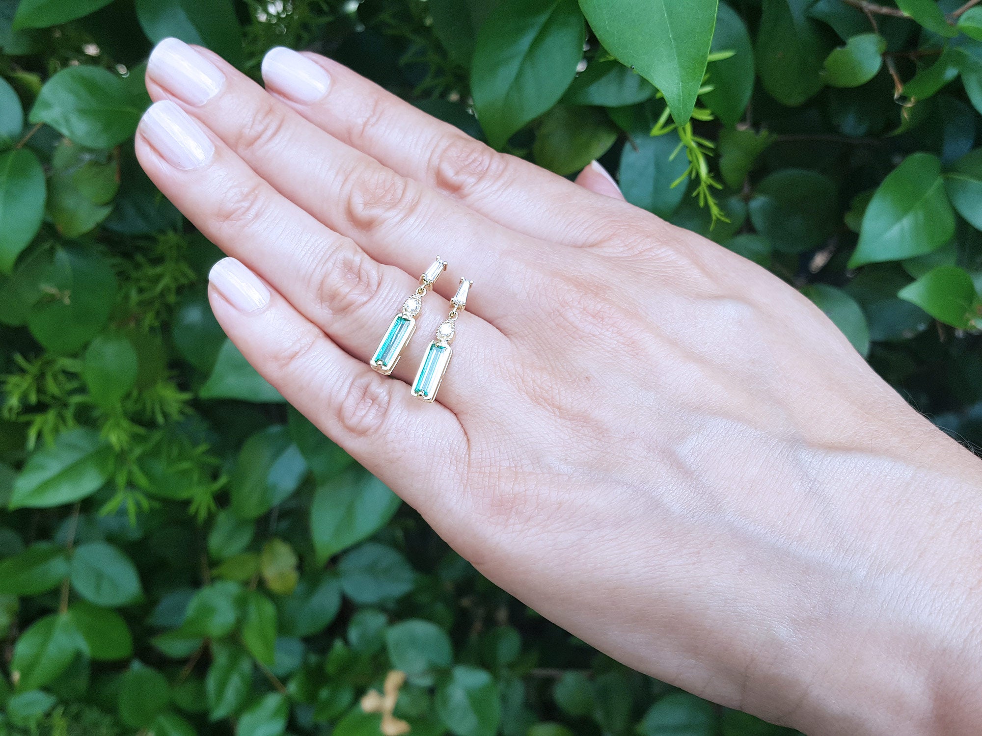 Emerald and diamond Baggette cut stud earrings