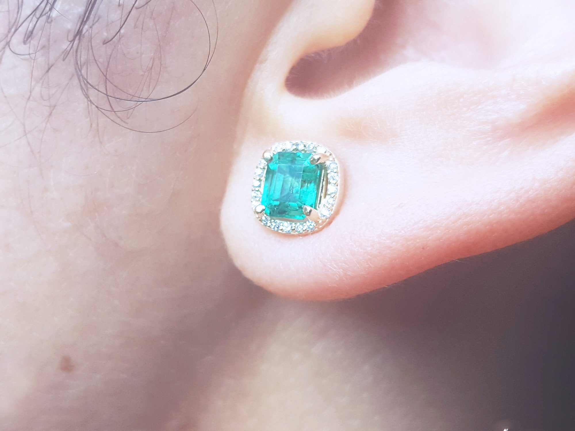 Real Halo emerald stud earrings