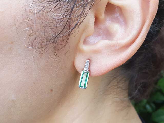 Emerald baguette cut diamond stud earrings