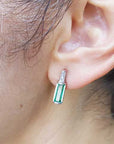 Emerald baguette cut diamond stud earrings