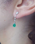 Pear cut emerald stud earrings