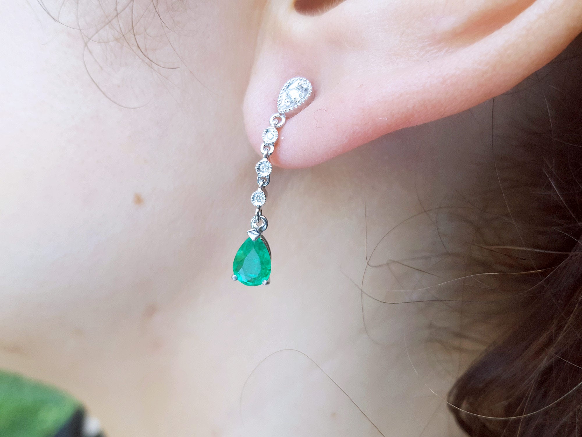 Dangle emerald earrings for women