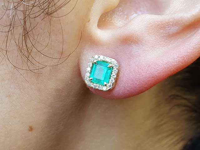 Yellow gold emerald diamond stud earrings