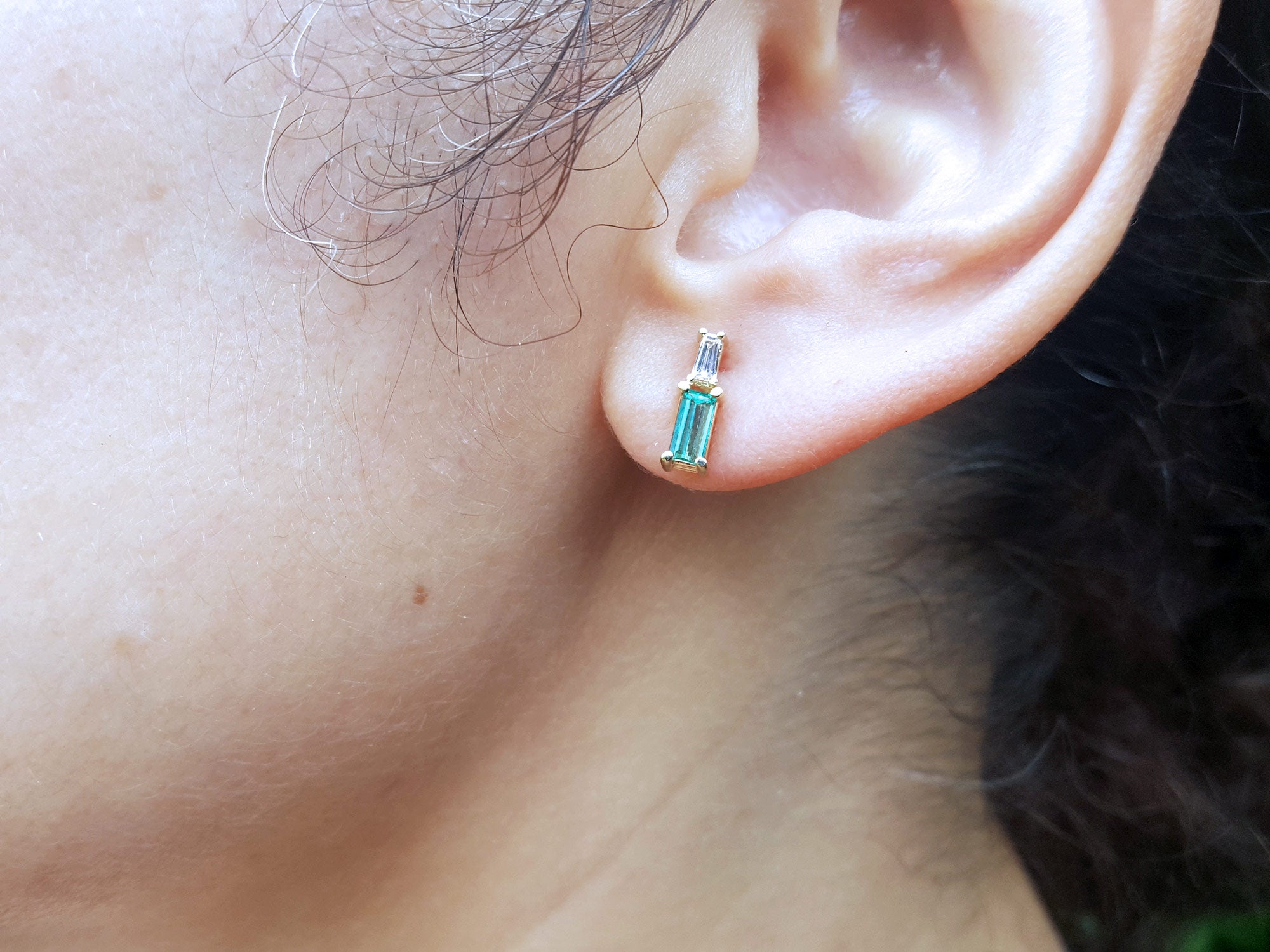 Mother&#39;s Day baguette cut emerald and diamond stud earrings