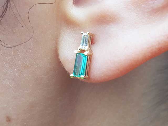 May birthstone emerald baguette stud earrings