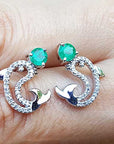 Genuine emerald dolphine stud earrings