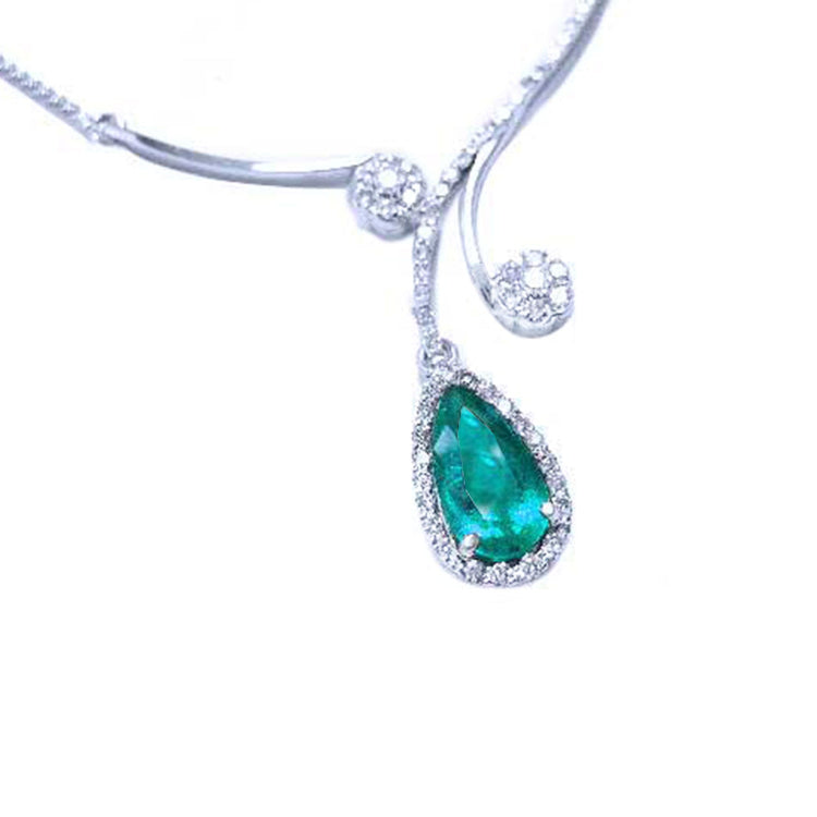 Emerald necklace fine jewelry from the Muzo mines in Colombia, encircled in a halo of natural diamond set in 18k white gold
