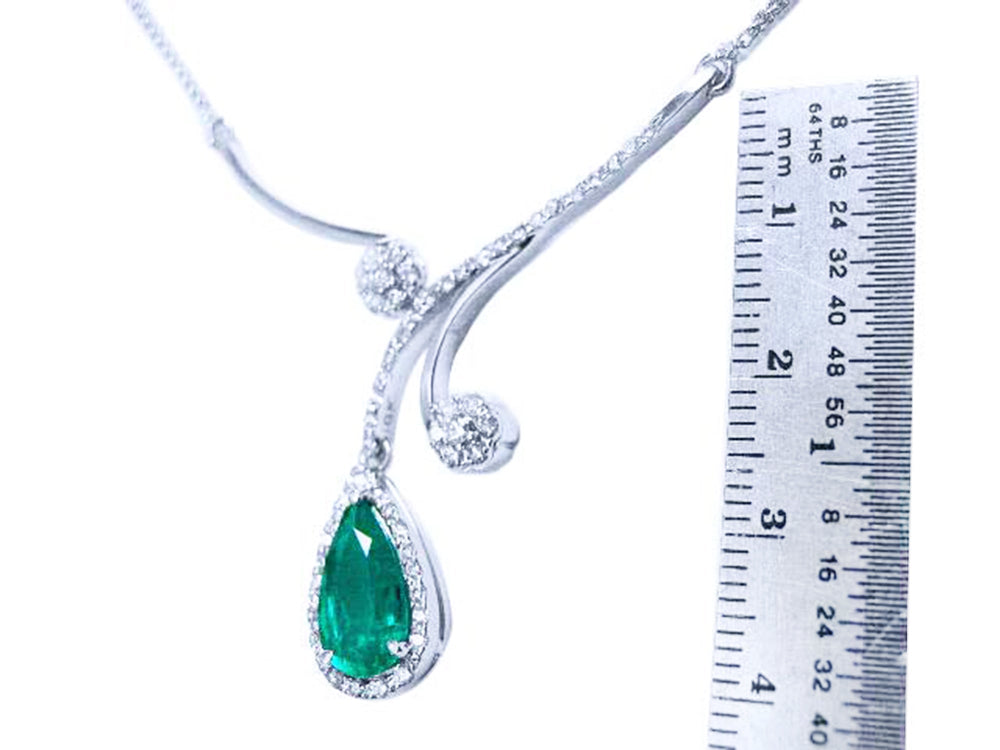 18k white gold emerald necklace this is a natural emerald source from the Muzo mines in Colombia, in a halo of natural diamond