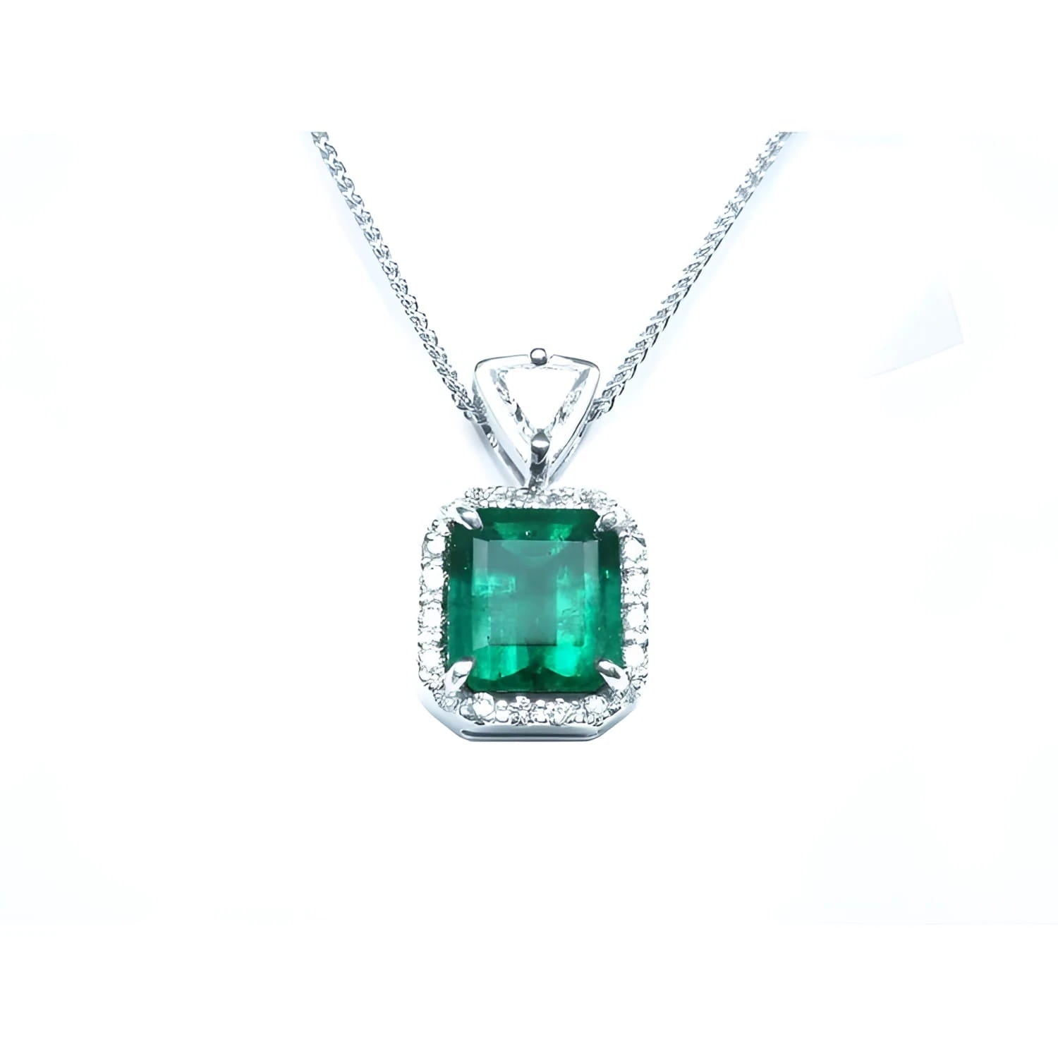 GIA certified Colombian emerald pendant with diamond halo in 18K white gold.