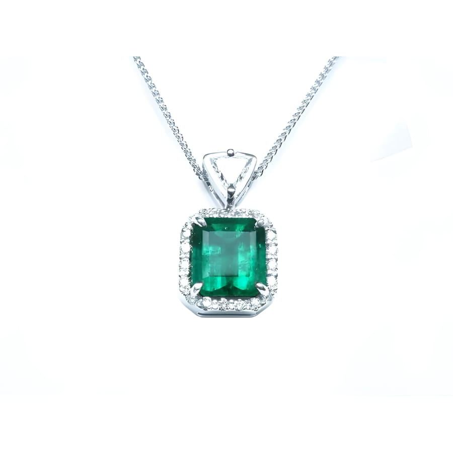GIA certified Colombian emerald pendant with diamond halo in 18K white gold.