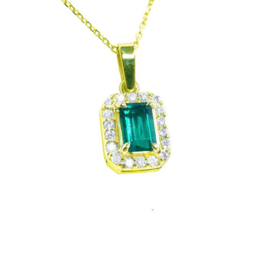 GIA certified F1 natural colombian emerald pendant halo diamond made of 18k yellow gold.