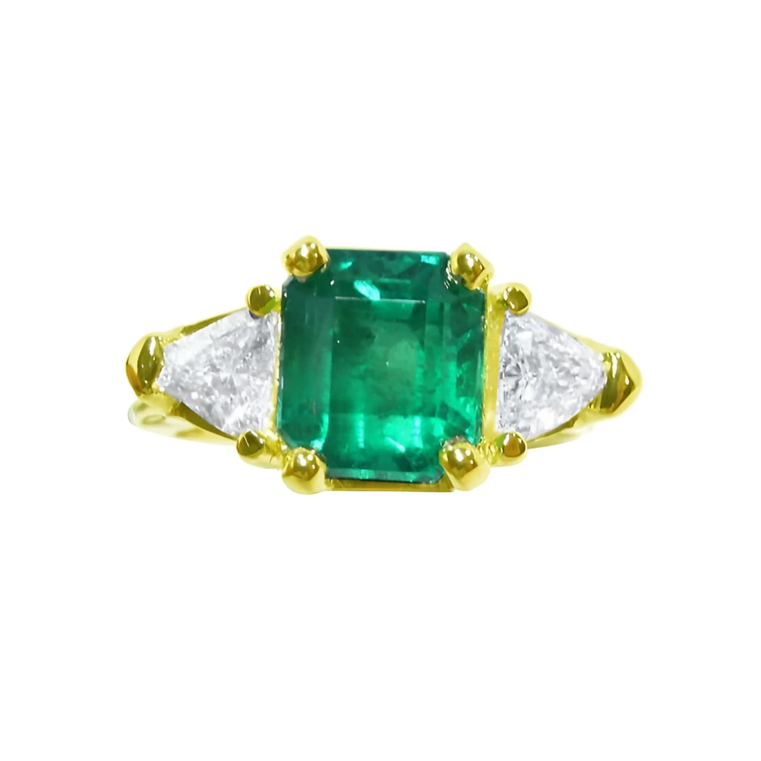 18K yellow gold ring with a GIA certified emerald and side trillion diamonds.