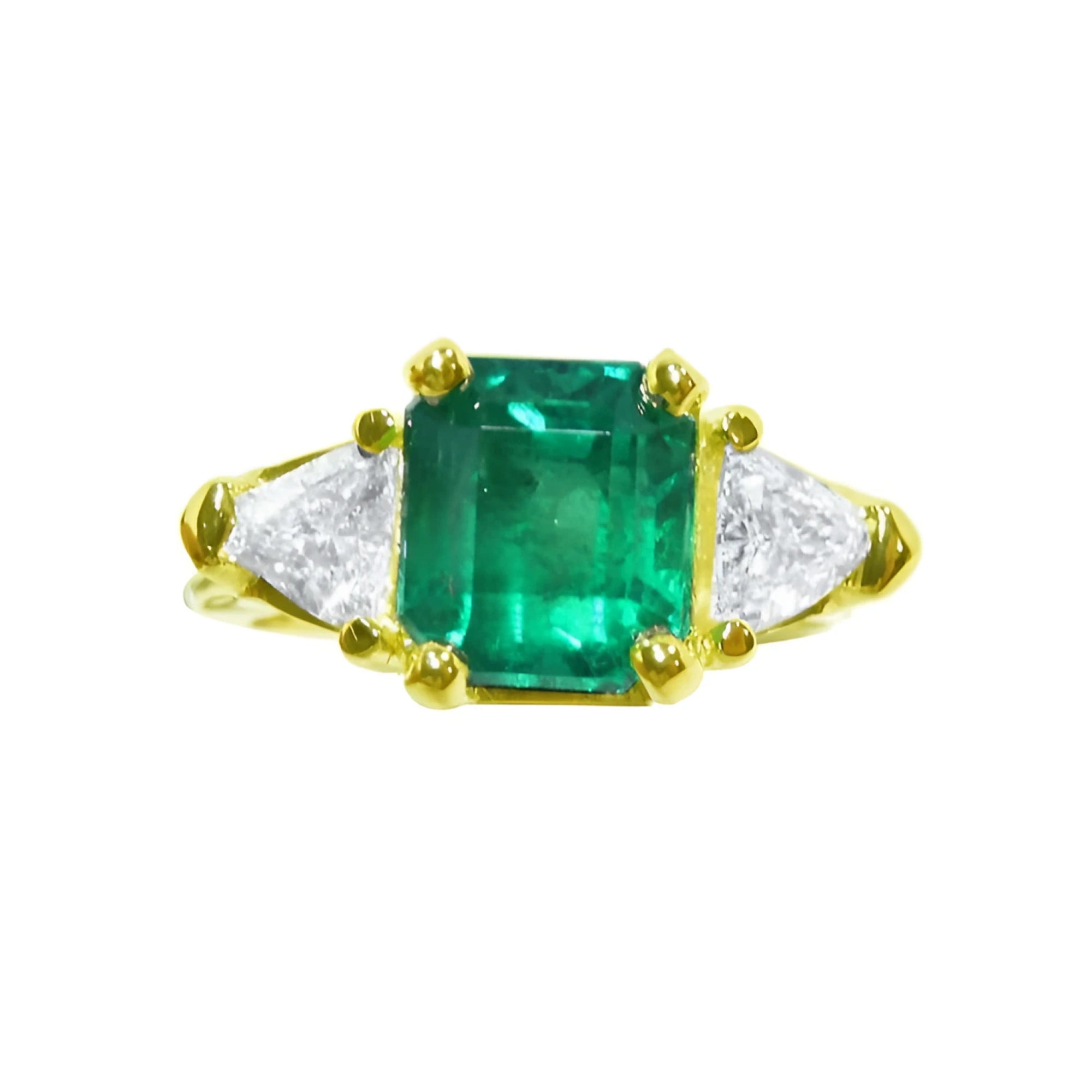 18K yellow gold ring with a GIA certified emerald and side trillion diamonds.