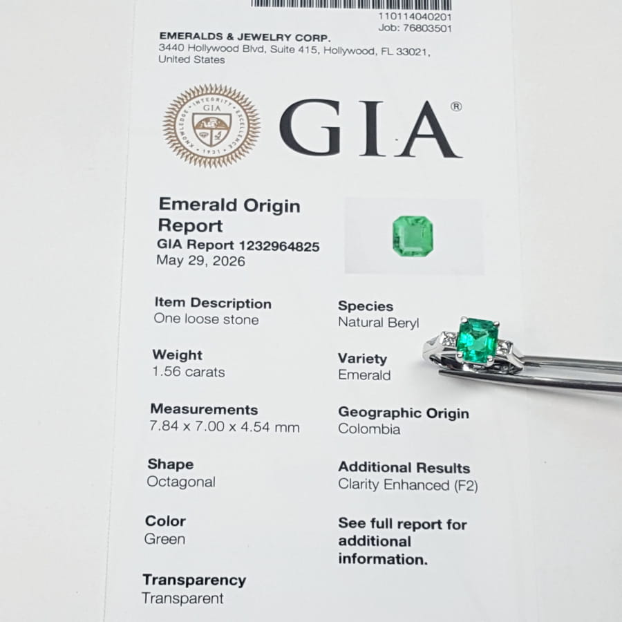 GIA emerald origin report with a loose emerald stone and its appraisal.
