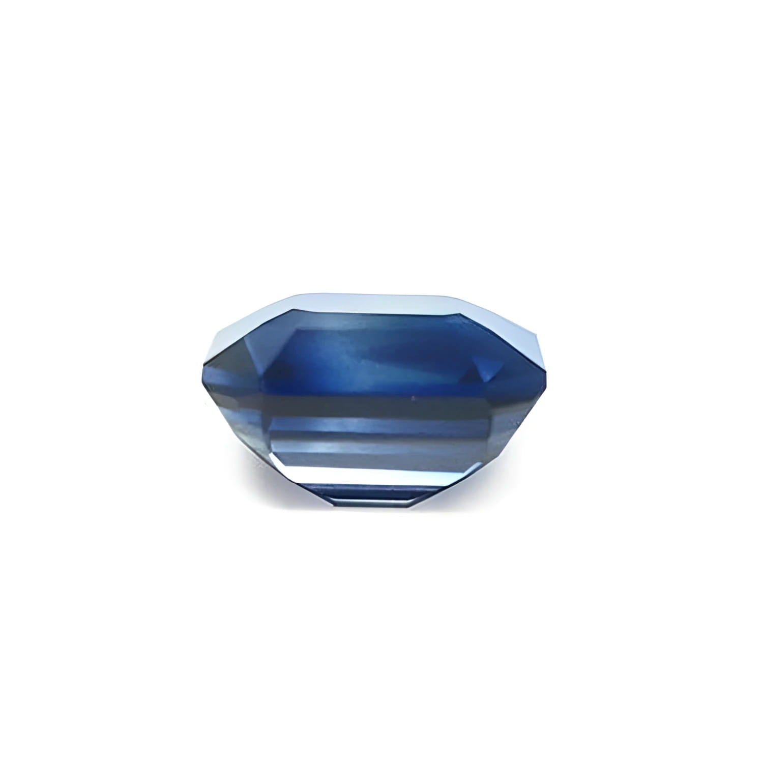 6.07 ct GIA certified natural untreated blue-green sapphire, rectangular emerald-cut.