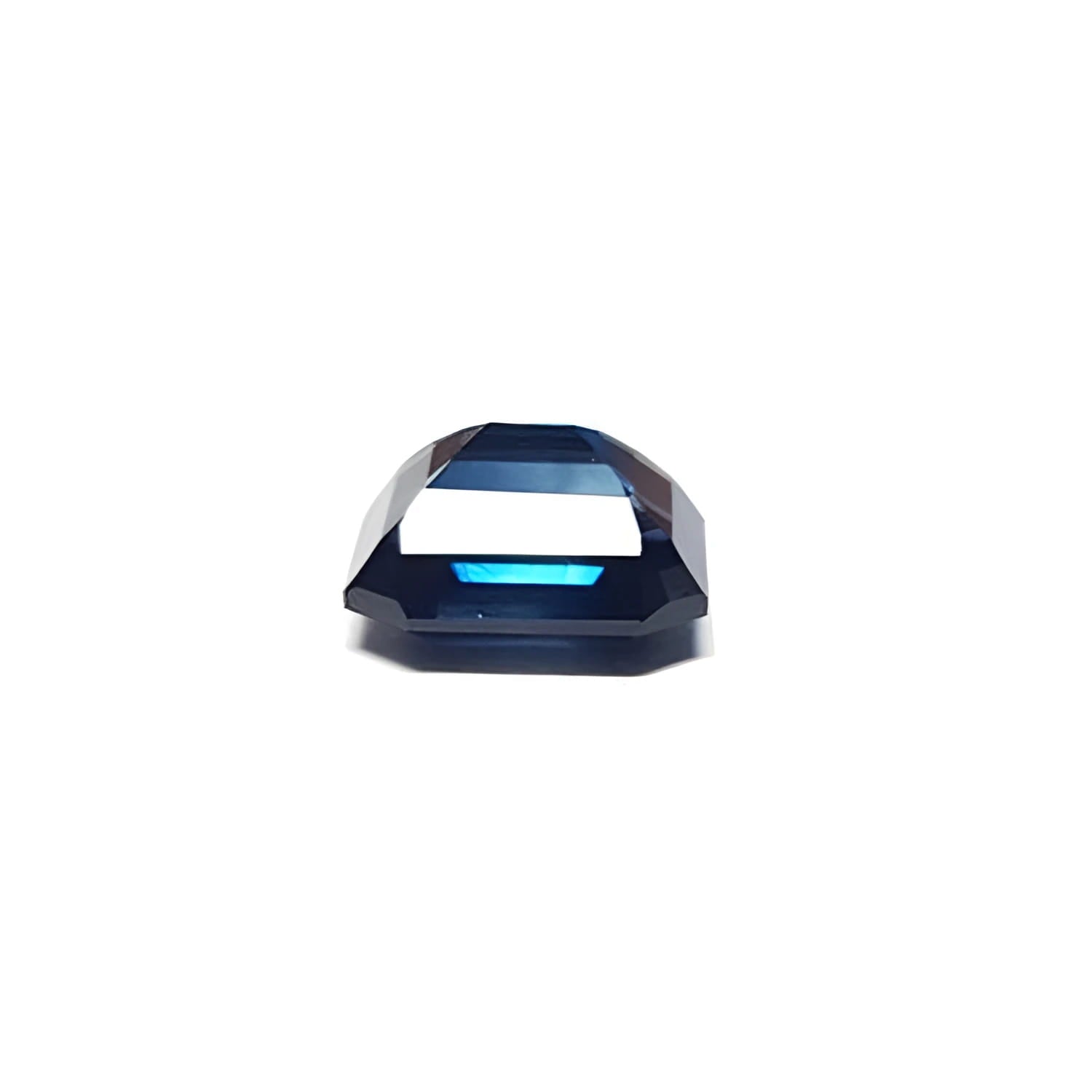 GIA certified 6.07 ct. natural untreated blue-green emerald-cut sapphire.