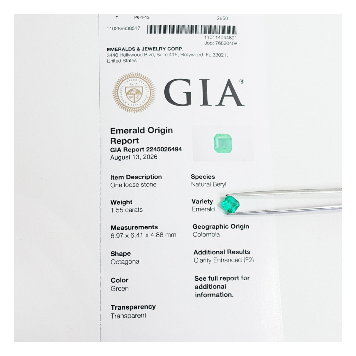 A GIA Emerald Origin Report card for a 1.55 ct. emerald-cut gemstone, with tweezers holding the emerald shown next to the report details.