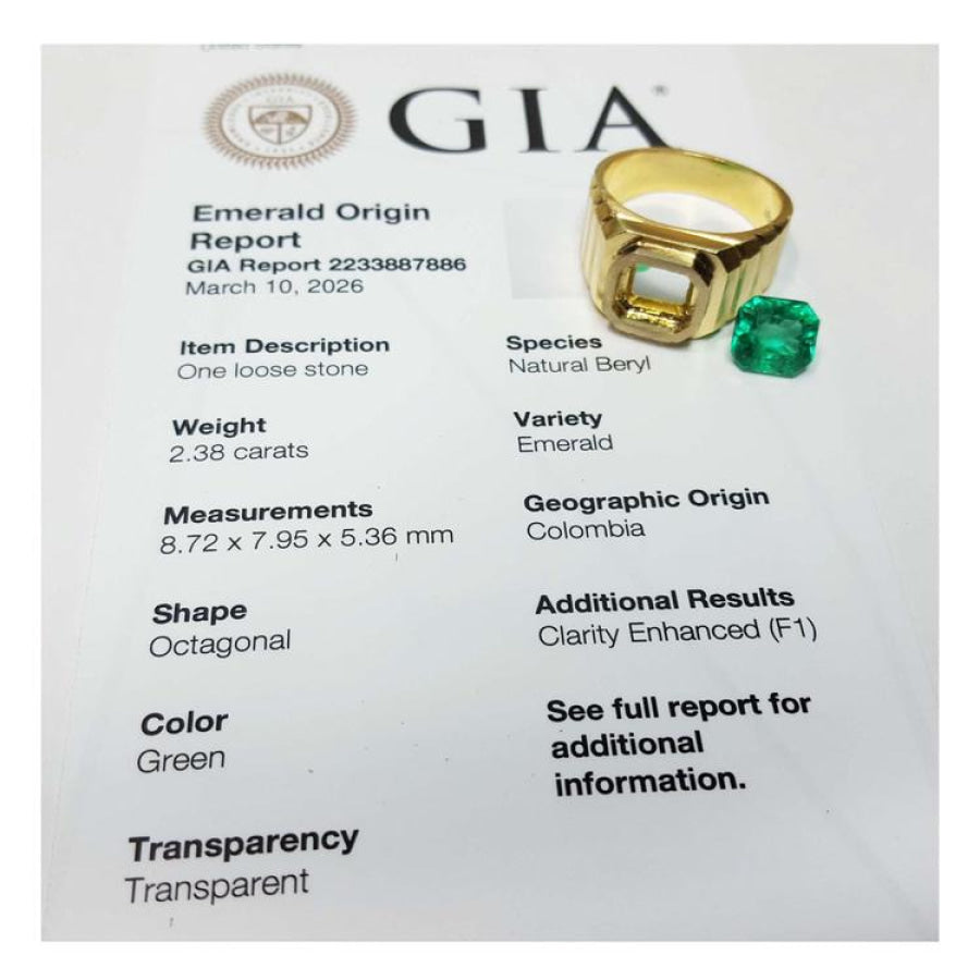 GIA certified 2.38 ct. octagonal emerald and 18K yellow gold men's ring with a full bezel setting.
