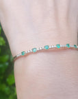 Adjustable emerald bangle bracelet