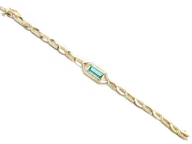 Hand made solid gold emerald bracelet