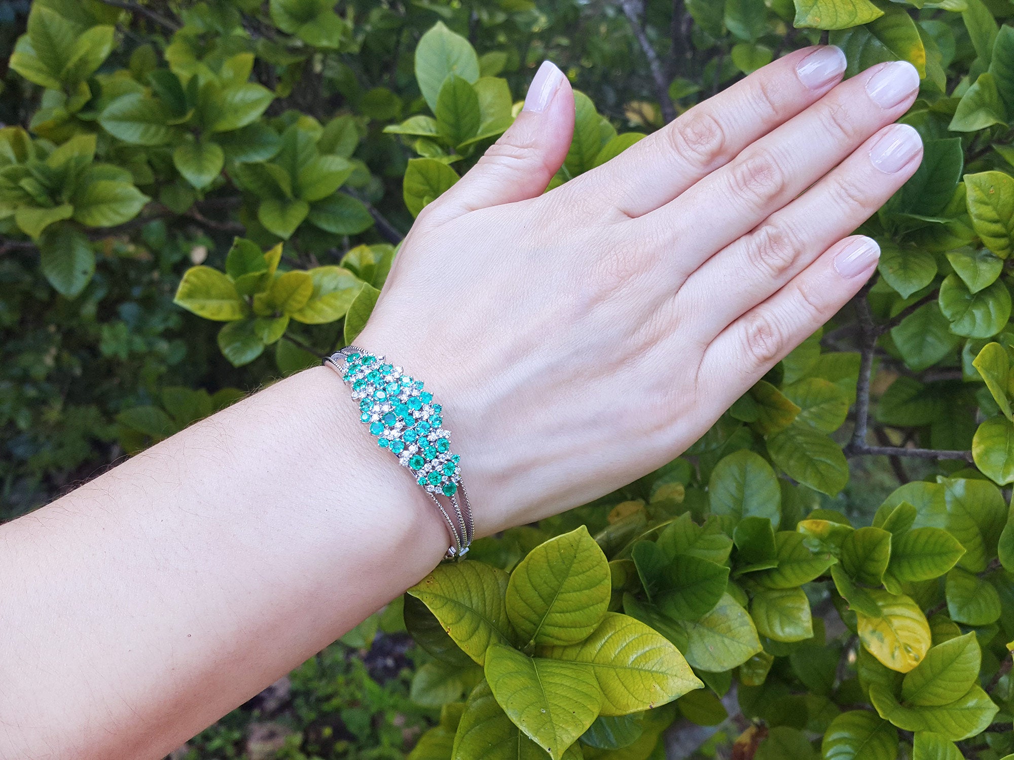 Round cut Colombian emerald bangle bracelets for sale