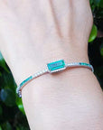 Emerald-cut ladies emerald bangle bracelet