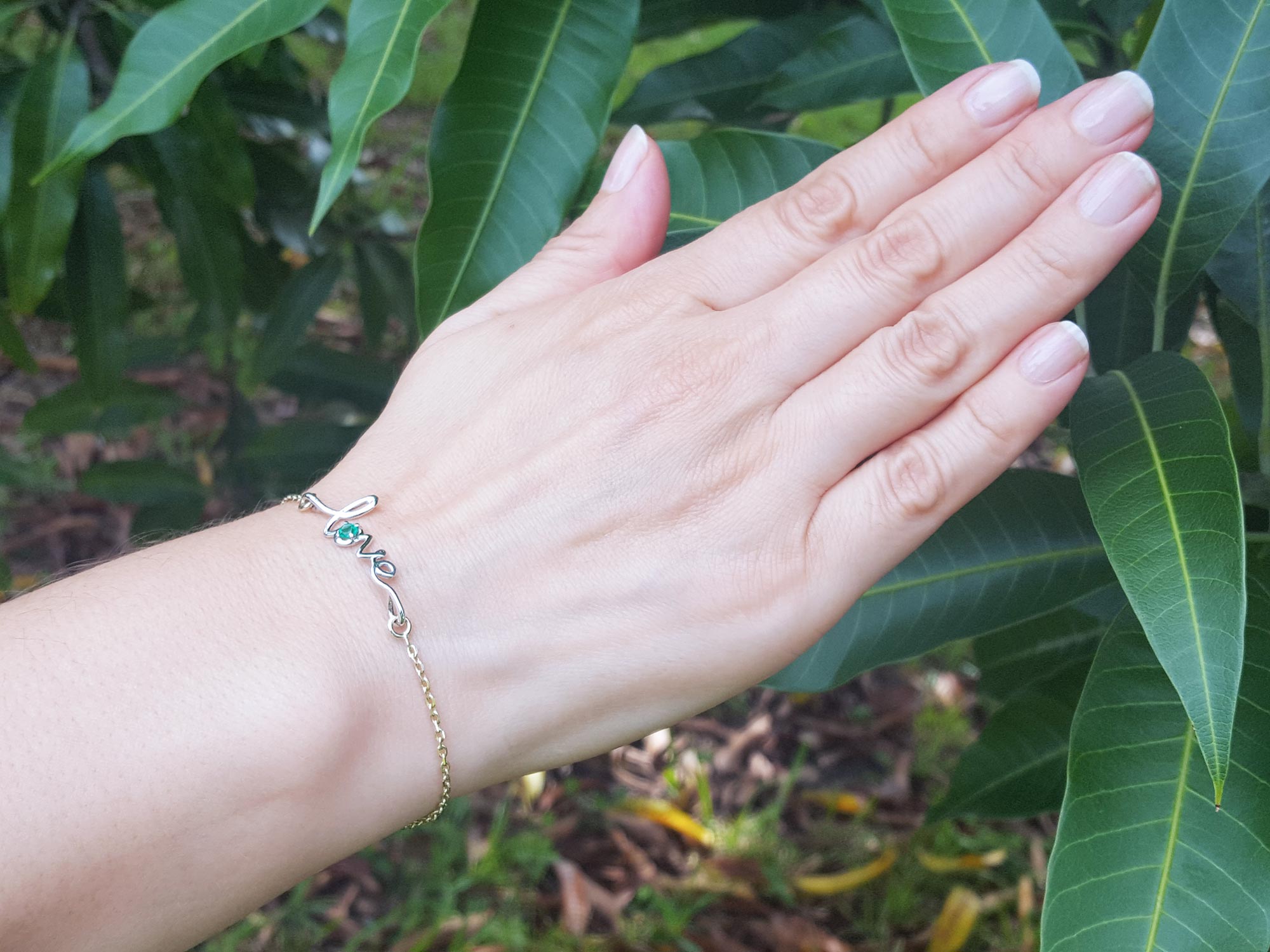 Two tone emerald love bracelet