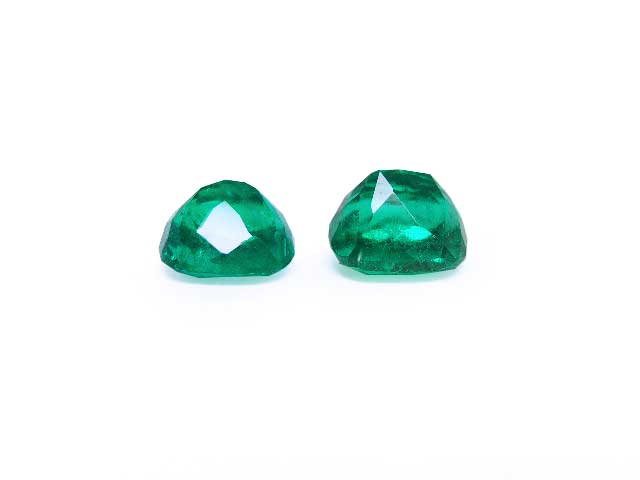 Deep green loose emeralds