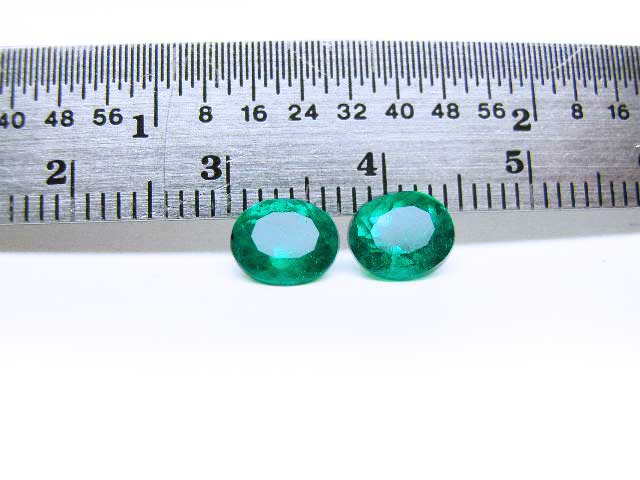 Deep green loose emeralds