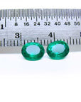 Deep green loose emeralds