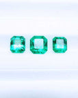 Deep green loose emeralds matching set