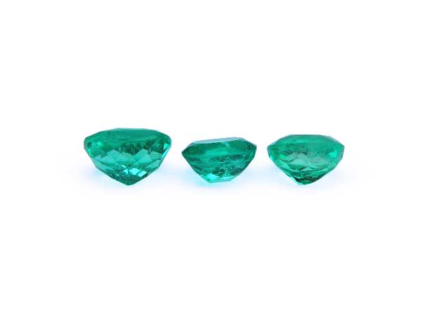 Deep green loose emeralds