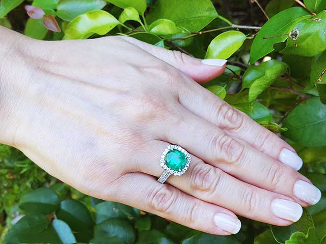 Cushion cut emerald rings