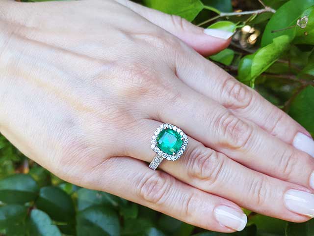 Women’s emerald and gold rings