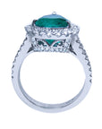 Anillo de oro blanco con esmeralda y diamantes
