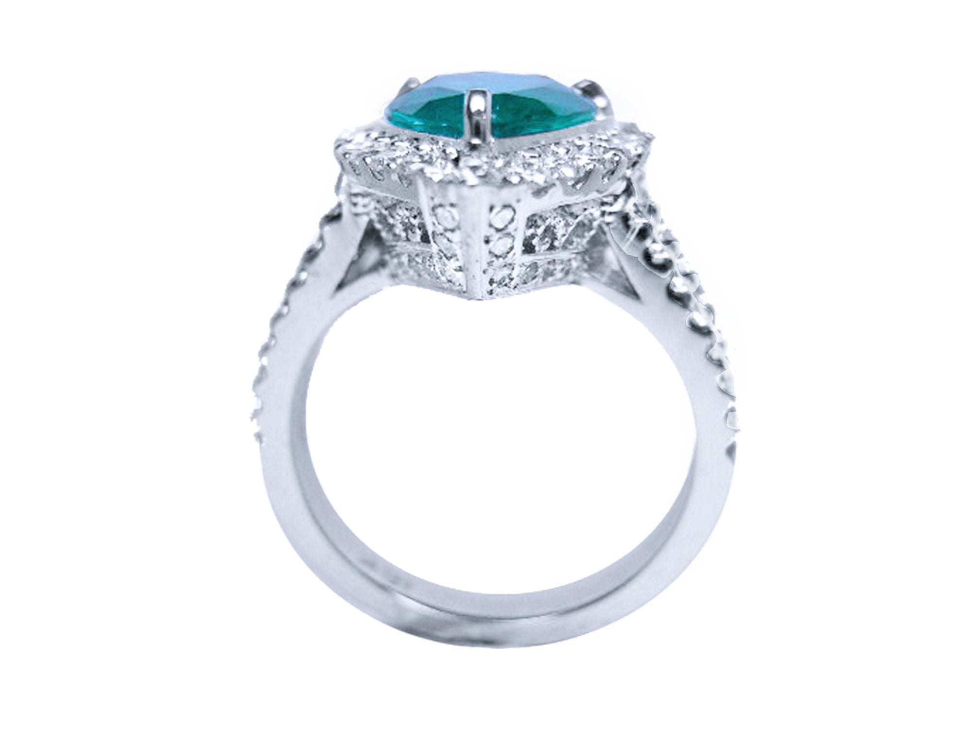 Esmeraldas y diamantes en anillo de compromiso