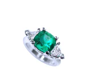Cushin cut Emerald engagement ring and Trillion Cut Diamonds